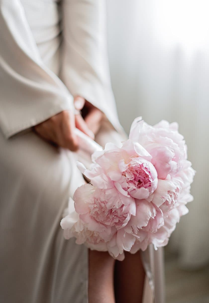 A peony held in two hands — a personalised Slimming gift voucher