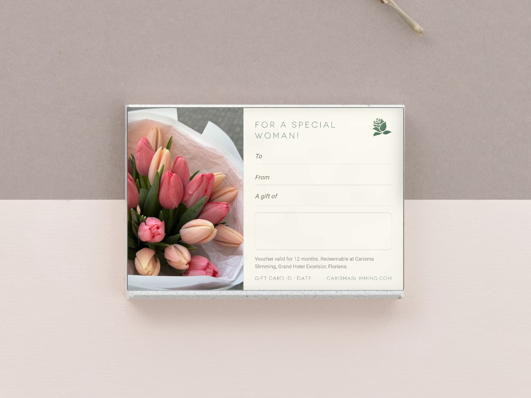 Women's Day Carisma Slimming gift card, styled flat-lay